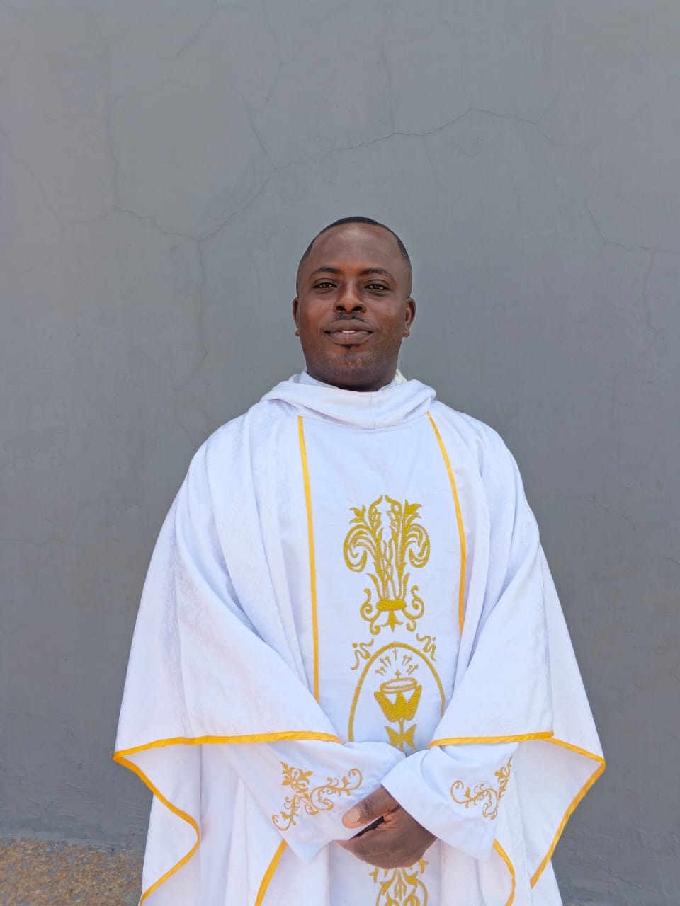 Portrait of Rev. Fr. Charles Bekpar, founder of Divine Love Ministry