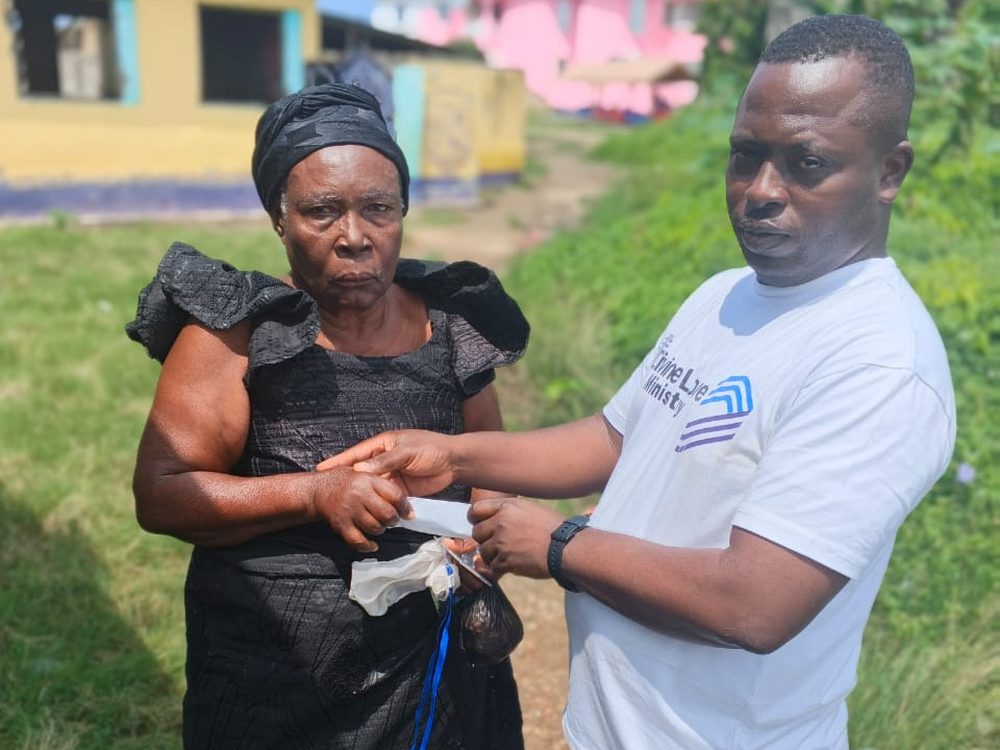 Support and cash donation for an elderly member of the community